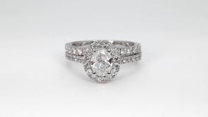 Natural 1-1/2 ct. tw. Oval Diamond Halo Wedding Set in 14K White Gold full view