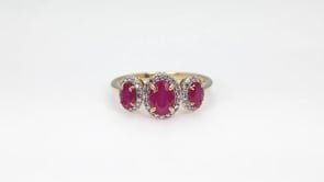 3-Stone Oval Ruby & 1/5 ct. tw. Diamond Halo Ring in 14K Yellow Gold side profile
