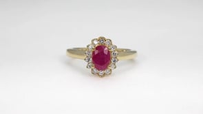 Oval Ruby & 1/4 ct. tw. Diamond Halo Ring in 10K Yellow Gold side profile