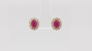 Oval Ruby & 1/4 ct. tw. Diamond Halo Earrings in 10K Yellow Gold front view