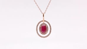 Oval Ruby & 1/7 ct. tw. Diamond Double Floating Halo Pendant in 10K Pink Gold front view