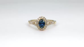 American Colors Oval Montana Sapphire & 1/4 ct. tw. Diamond Halo Split Shank Ring in 10K Yellow Gold side profile
