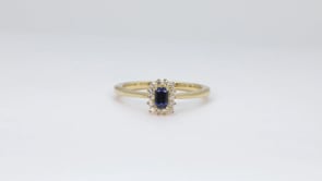 Emerald Cut Yogo Sapphire & 1/10 ct. tw. Diamond Halo Ring in 10K Yellow Gold side profile