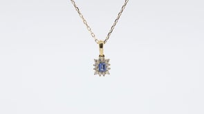 Baguette Yogo Sapphire & 1/10 ct. tw. Diamond Halo Pendant in 10K Yellow Gold close-up detail