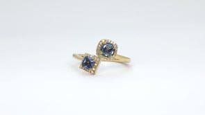Pear & Cushion Yogo Sapphire & Diamond Halo Toi et Moi Ring in 10K White Gold close-up detail