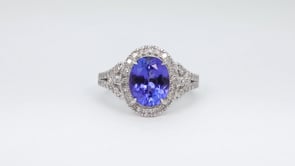 Oval Tanzanite & 1/2 ct. tw. Diamond Halo Ring in 14K White Gold close-up detail