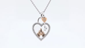 Enchanted Disney 1/6 ct. tw. Diamond 100th Anniversary Heart & Key Pendant with Quartz Lens in Sterling close-up detail