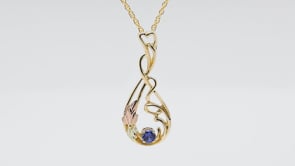 Black Hills Gold Round Yogo Sapphire Vine & Leaf Teardrop Pendant in 10K Yellow Gold front view
