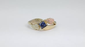 Black Hills Gold Princess Cut Yogo Sapphire Double Leaf Ring in 10K Yellow Gold close-up detail