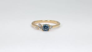 1/2 ct. tw. Cushion Treated Blue Diamond Ring in 14K Yellow Gold close-up detail