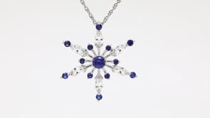 Created Blue & White Sapphire Snowflake Pendant in Sterling Silver close-up detail