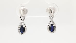 Genuine Blue & Created White Sapphire Infinity Pendant & Earring Set in Sterling Silver side profile