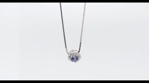 Yogo Sapphire & 1/10 ct. tw. Diamond Halo Pendant in 14K White Gold front view