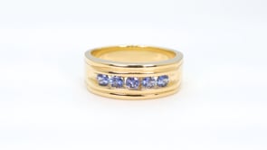 Yogo Sapphire Men's 5-Stone Channel Set Ring in 14K Yellow Gold close-up detail