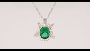 Black Hills Gold Oval Helenite Turtle Pendant in Sterling Silver front view