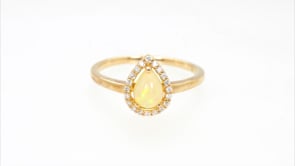 Pear Opal & 1/8 ct. tw. Diamond Halo Ring in 14K Yellow Gold close-up detail