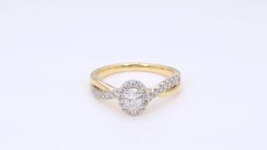 True Promise 1/2 ct. tw. Oval Diamond Halo Twist Engagement Ring in 14K Yellow & White Gold close-up detail