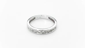 1/2 ct. tw Round Brilliant Diamond Channel Set Anniversary Band in 10K White Gold close-up detail