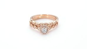 True Promise 1/4 ct. tw. Round Diamond Halo Wedding Set with Vintage Inspired Detailing in 10K Pink Gold side profile