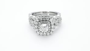 Natural 2-1/2 ct. tw. Cushion Diamond Double Halo Twist Wedding Set in 14K White Gold angled view
