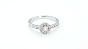 Natural 1/2 ct. tw. Round Brilliant Diamond Halo Engagement Ring in 14K White Gold close-up detail