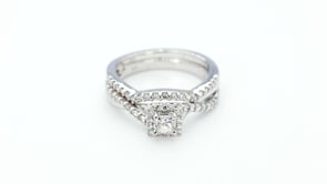 Natural 3/4 ct. tw. Princess Cut Diamond Halo Twist Wedding Set in 10K White Gold side profile