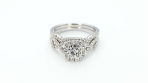 Natural 1 ct. tw. Round Brilliant Diamond Halo Twist Wedding Set in 10K White Gold side profile