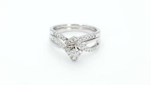 Natural 1/2 ct. tw. Princess Cut Diamond Angular Halo Wedding Set in 10K White Gold close-up detail