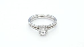 Natural 5/8 ct. tw. Pear Diamond Halo Wedding Set in 14K White Gold close-up detail