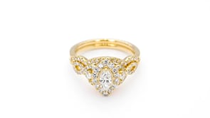 Natural 1-1/5 ct. tw. Marquise & Round Diamond Halo Twist Wedding Set in 14K Yellow Gold close-up detail