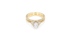 Noventa 1 ct. tw. Oval Diamond Hidden Halo Wedding Set with Side Diamond Cluster Accent in 14K Yellow Gold side profile