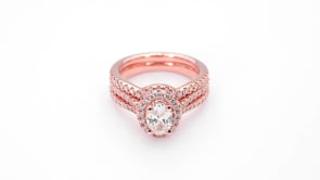 Noventa 1-1/2 ct. tw. Oval Halo Diamond Wedding Set with Cut-Out Accented Band in 14K Pink Gold full view