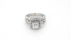 Natural 2-1/2 ct. tw. Princess Cut Diamond Double Halo Twist Wedding Set in 14K White Gold angled view