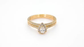 Natural 5/8 ct. tw. Pear Diamond Halo Wedding Set in 14K Yellow Gold front view