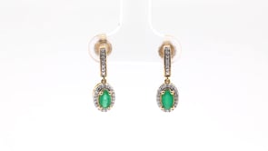 Green Oval Emerald and 1/10 ct. tw. Diamond Halo Earrings with Filigree Design in 10K Yellow Gold front view