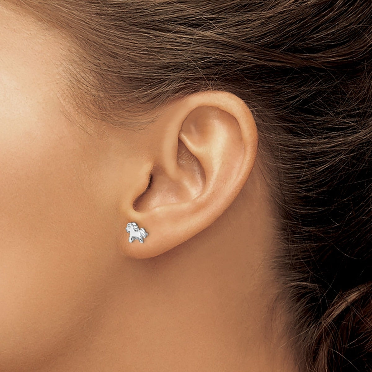 Children's Polished Pony Earrings in Rhodium Plated Sterling Silver close-up detail
