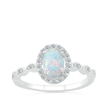 Oval Opal & 1/6 ct. tw. Diamond Halo Ring in 10K White Gold
