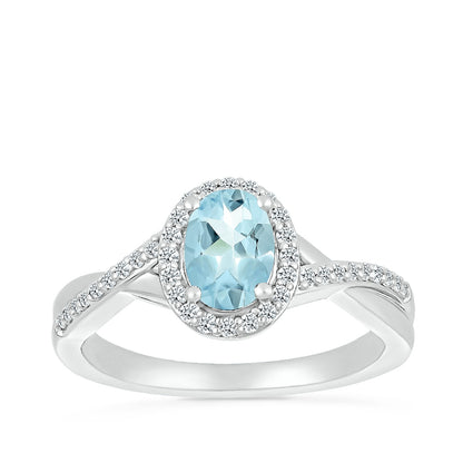 Oval Aquamarine & 1/5 ct. tw. Diamond Halo Twist Ring in 10K White Gold