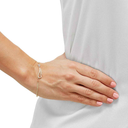 Angel Wing, Cross, and Heart Bracelet in 10K Tri Color Gold side profile