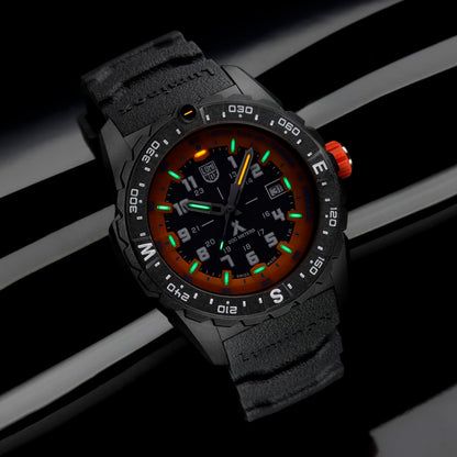 Luminox Men's Bear Grylls Survival Quartz Black Carbonox Watch with Black & Orange Dial & Rubber Strap side profile