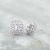 white gold emerald cut lab-grown diamond double halo stud earrings  beauty shot